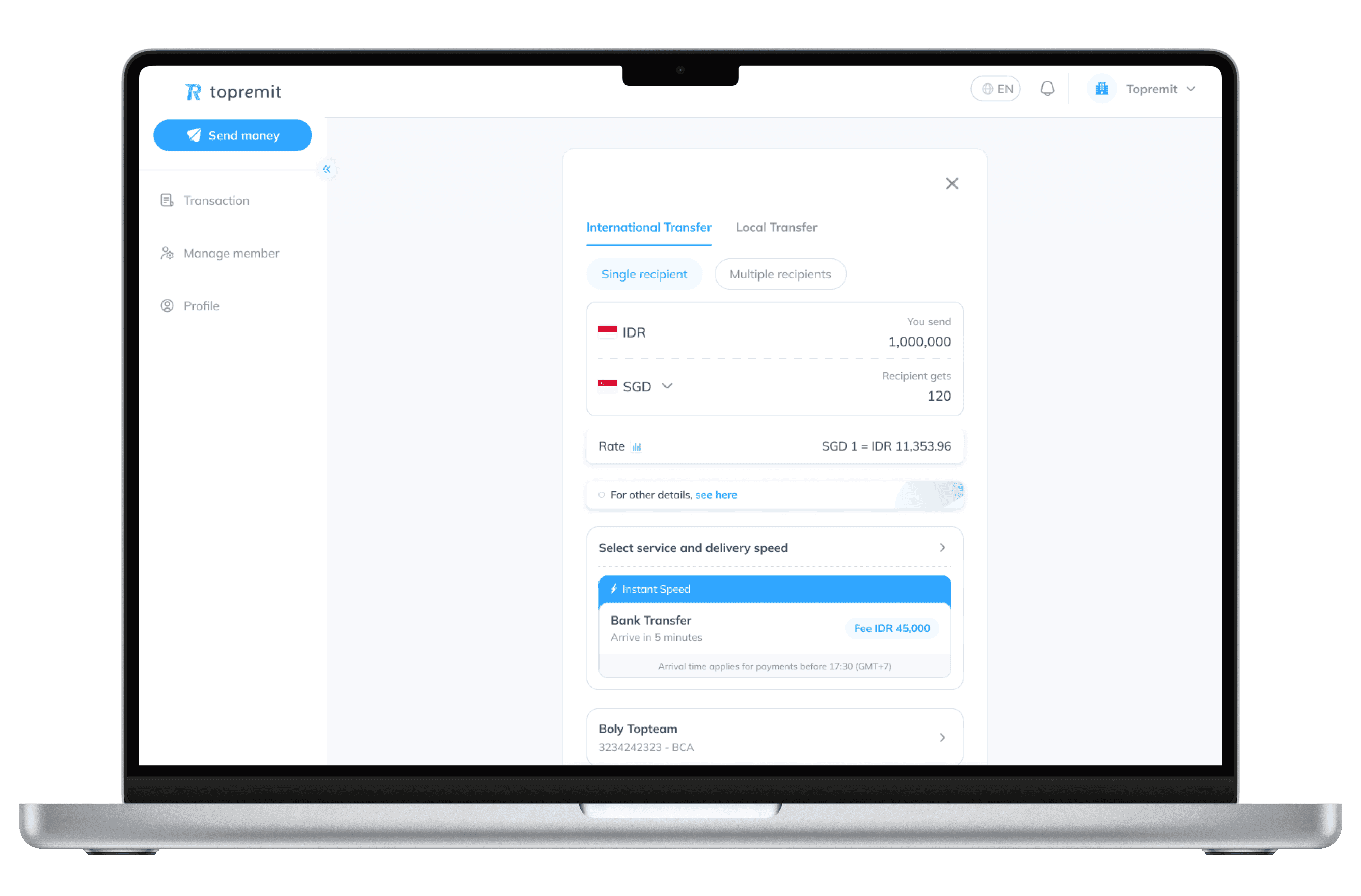Layar laptop menampilkan layanan Transfer Internasional di dashboard Topremit for Business.