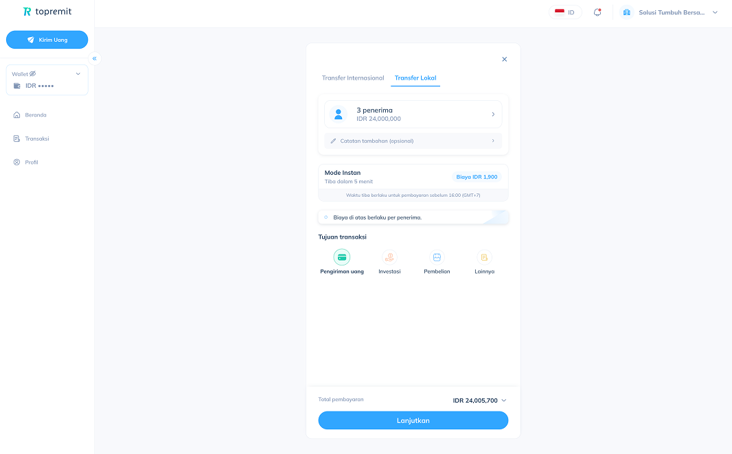 Layar laptop menampilkan layanan Transfer Lokal di dashboard Topremit for Business.
